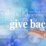 hand with give back text
