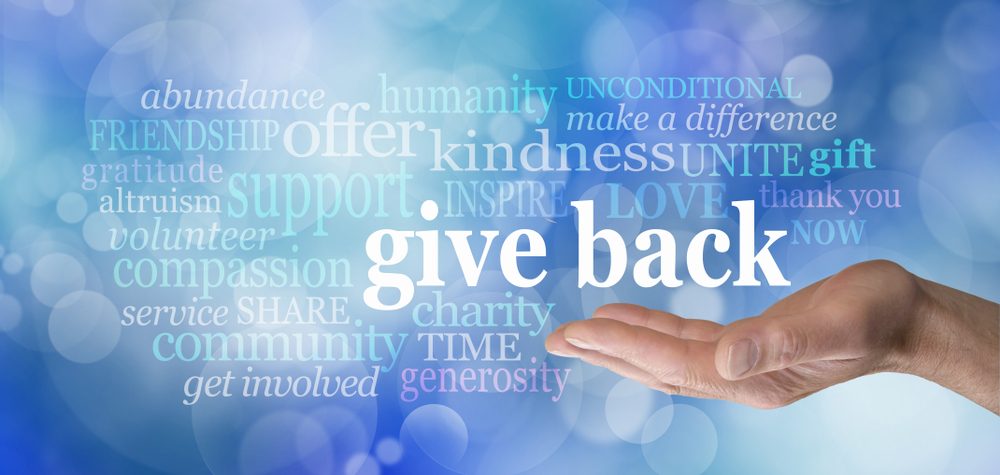 hand with give back text