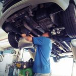 mechanic fixing the car